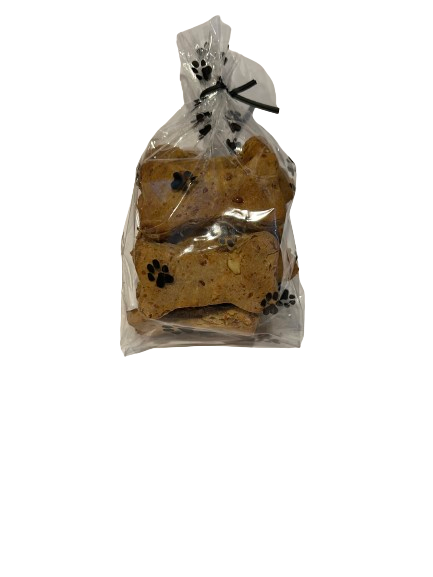 A bag of dog treats with paw prints on them.